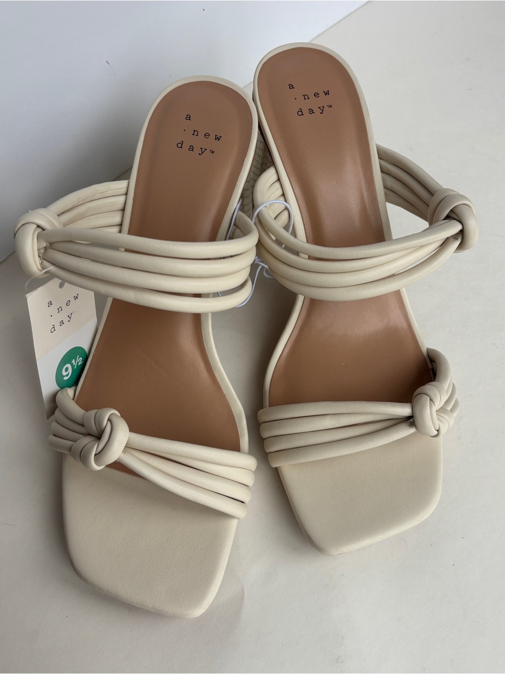 A New Day cream & white sandals with snakeskin texture on the heel, size US 9.5